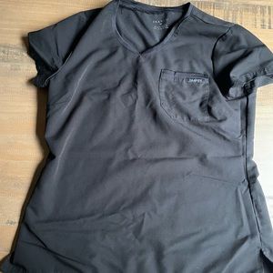 Jaanuu black scrub top with side pockets